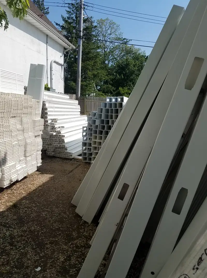 White vinyl fence with decorative top trim by Fencing By Excellence near Hazlet, Monmouth County NJ