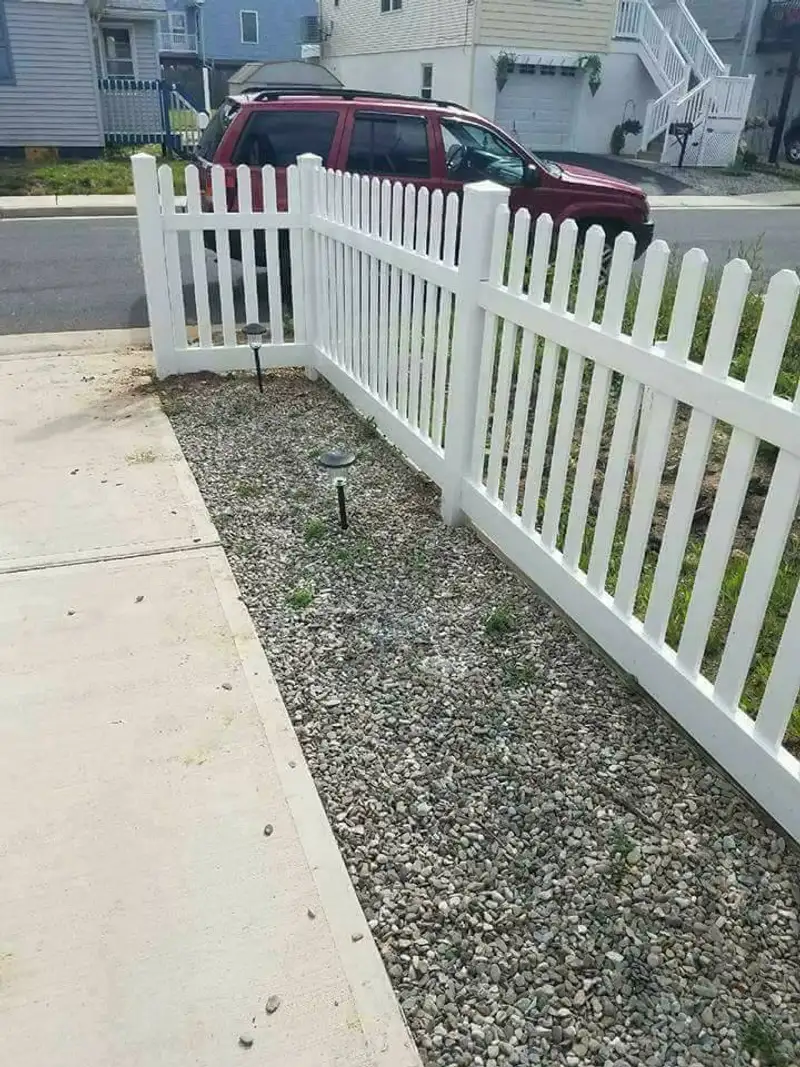 Vinyl gate with cross-board design by Fencing By Excellence near Hazlet, Monmouth County NJ