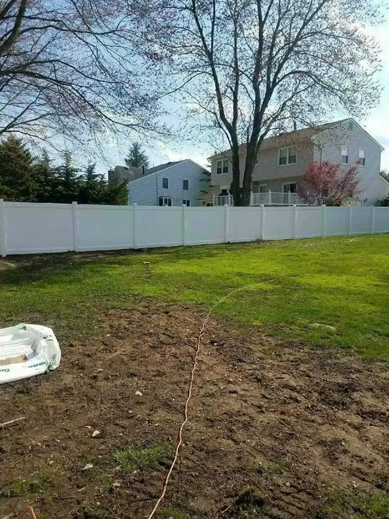 Vinyl privacy fence residential installation by Fencing By Excellence near Keyport, Monmouth County NJ