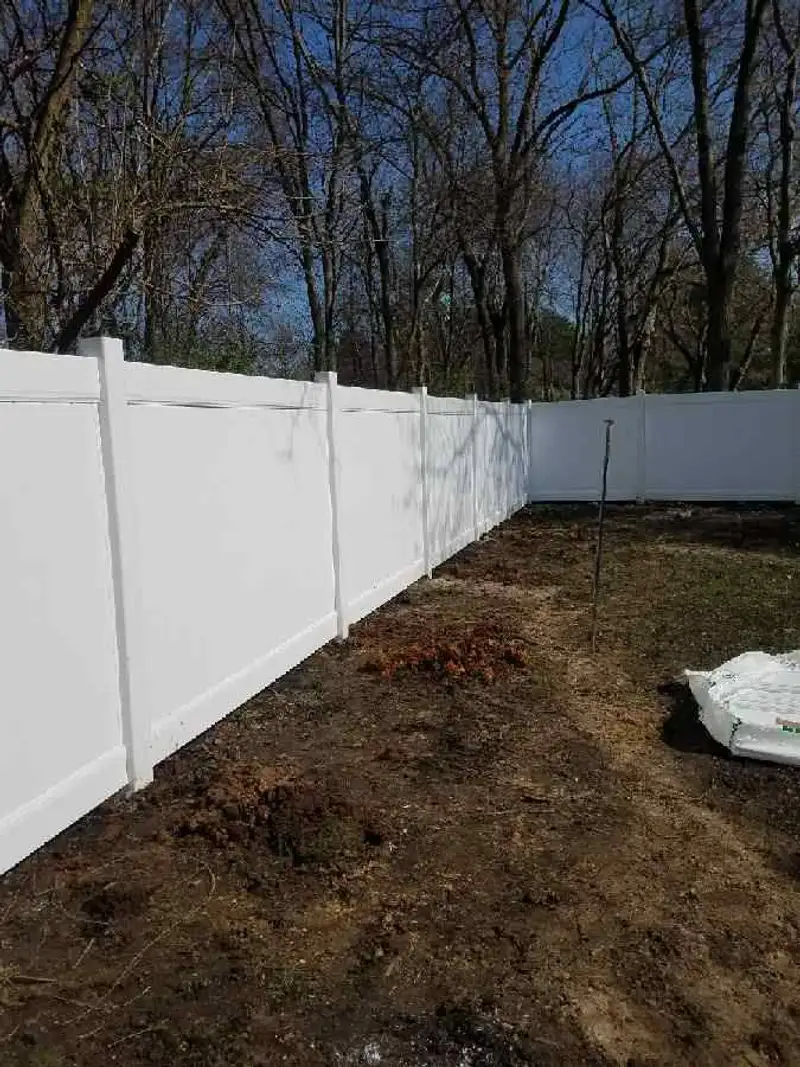 White vinyl gate installation completed by Fencing By Excellence near Aberdeen, Monmouth County NJ