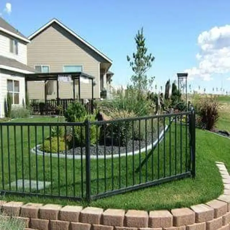 Black aluminum fence with curved design and gate by Fencing By Excellence near Matawan, Monmouth County NJ