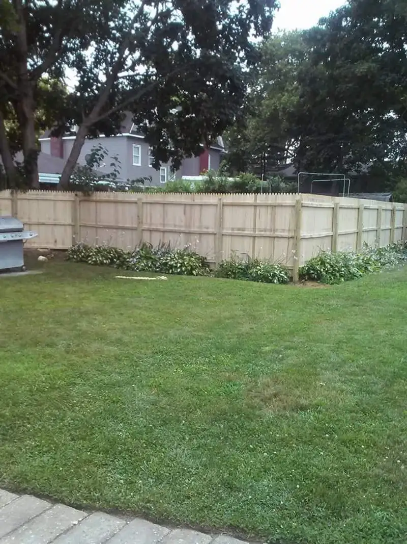 Fence installation with professional equipment by Fencing By Excellence near Howell, Monmouth County NJ