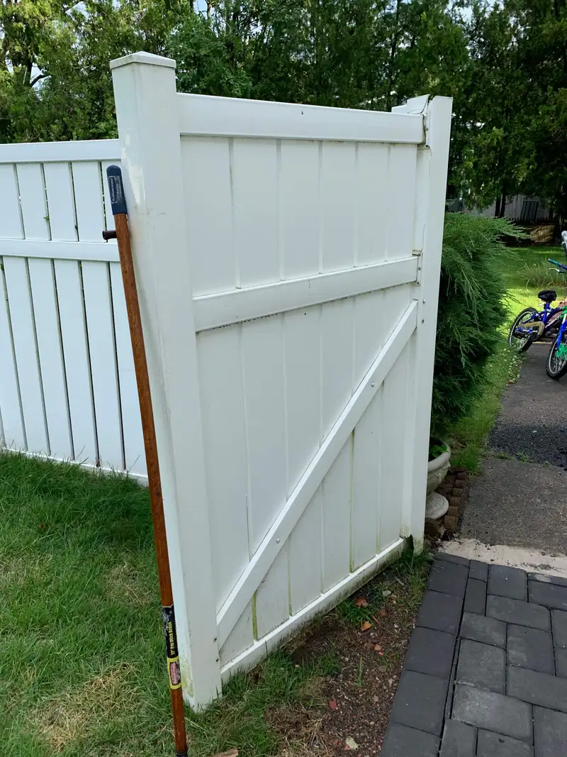 White vinyl horizontal board gate detail by Fencing By Excellence near Matawan, Monmouth County NJ